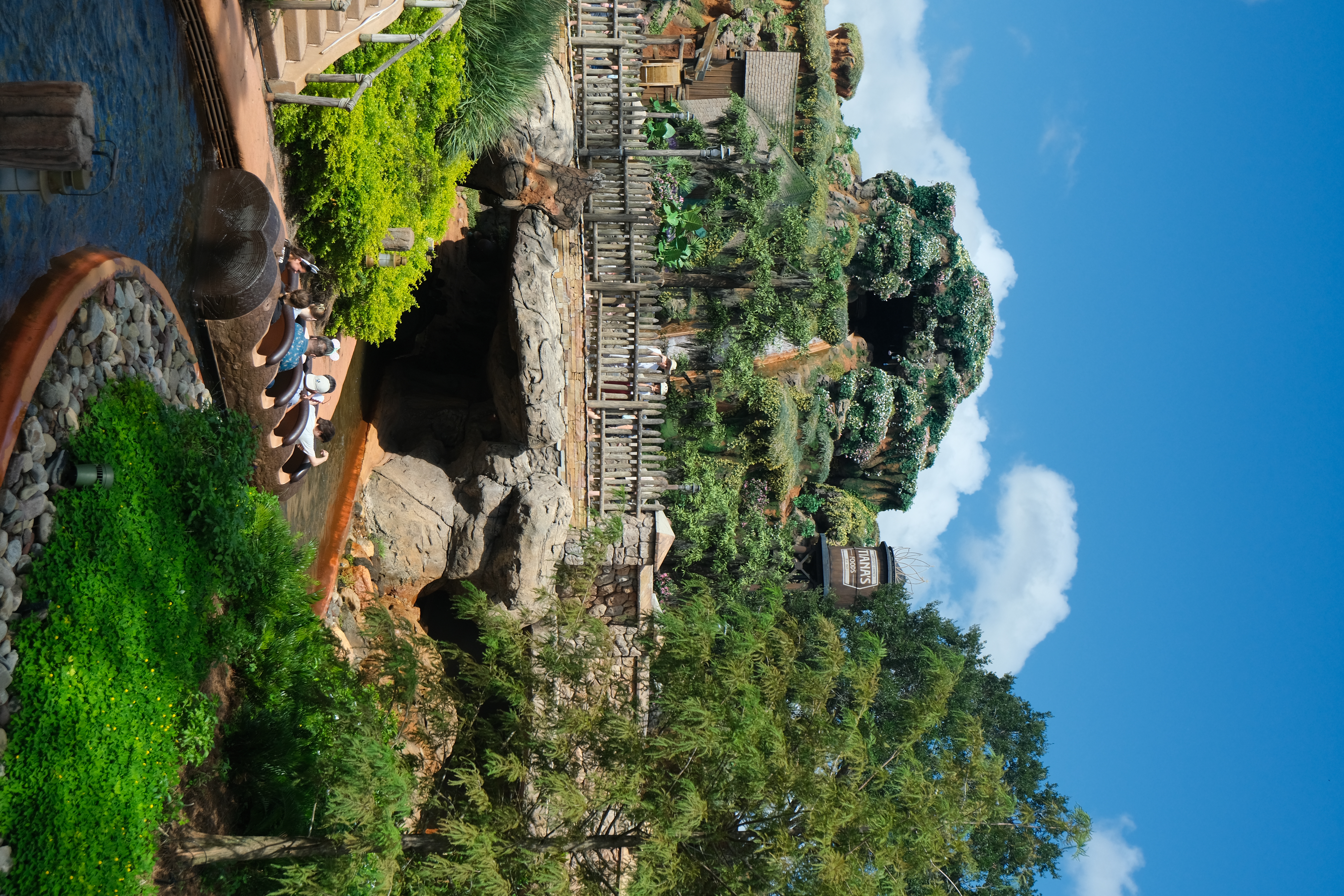A photo of a log flume in front of Tiana's Bayou Adventure at Walt Disney World